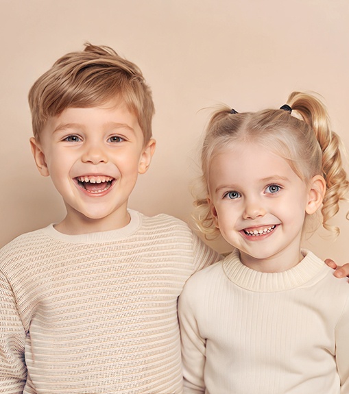 Two happy, smiling children